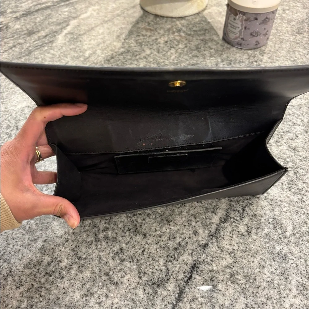 Yves Saint Laurent Black Clutch with Gold Logo - Picture 3 of 3